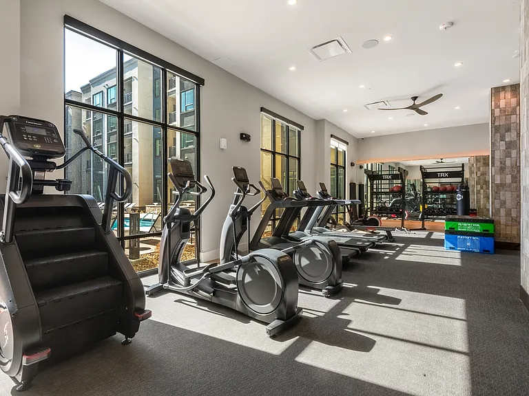 Light-Filled Fitness Center with Treadmills, Ellipticals, and Training Area