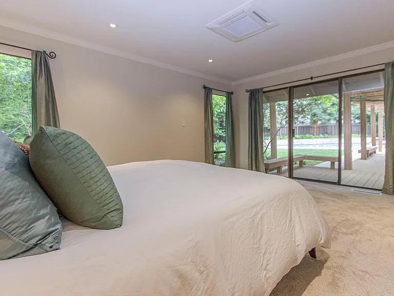 Master Bedroom with access to backyard