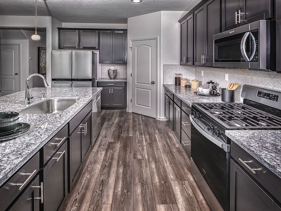 Residence 4 kitchen modeled at a nearby Meritage community.