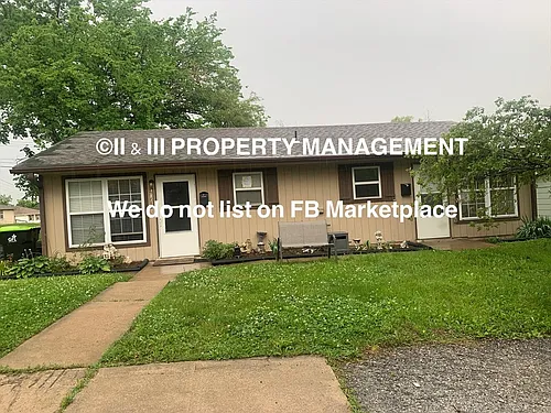 6008 E 151st Ter #B Photo 1