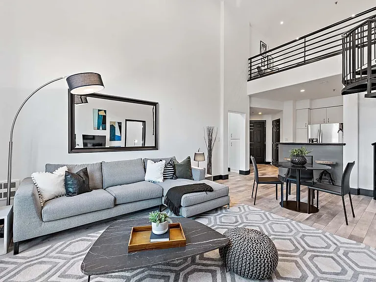 living room, seen above is loft living area (not seen to the right is 3rd bedroom/flexible WFH office room)