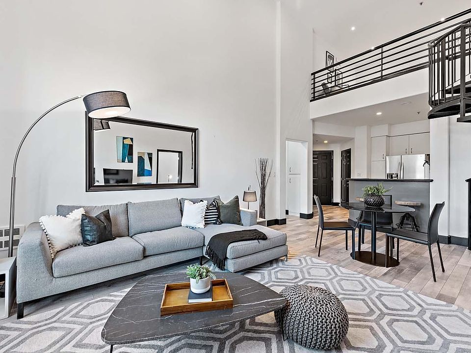 living room, seen above is loft living area (not seen to the right is 3rd bedroom/flexible WFH office room)