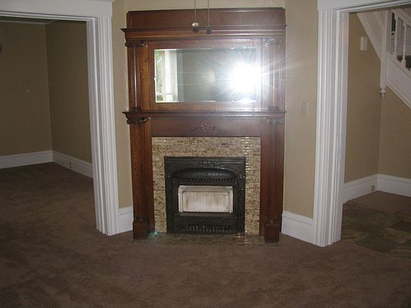 Living room with dining room to the left on photo.