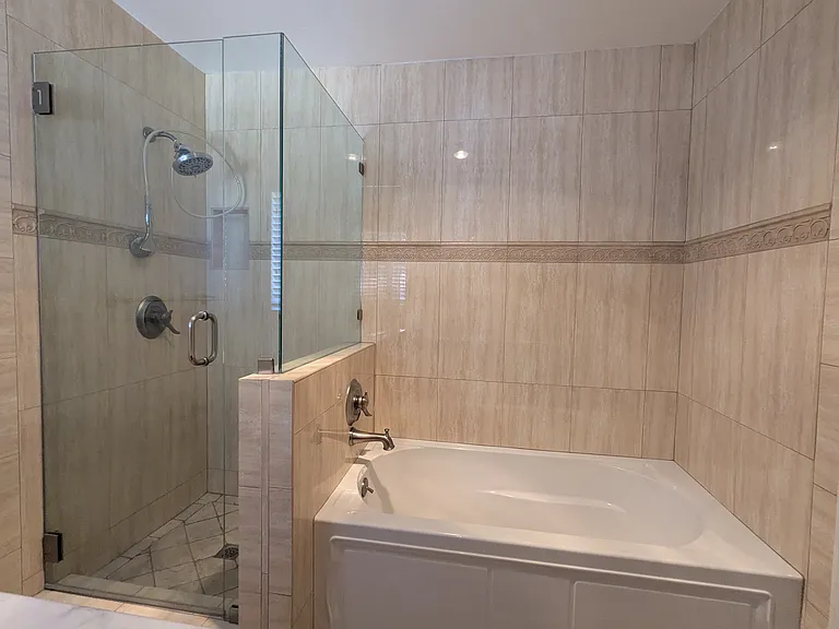 Master Bathroom with tub and separate shower