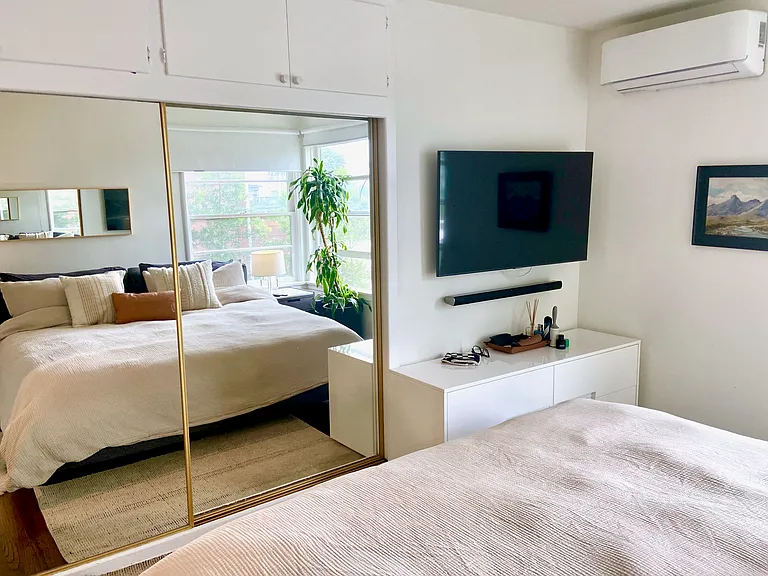 Bedroom shown furnished to illustrate layout and room size.