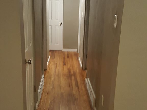 Newly refinished hardwood to