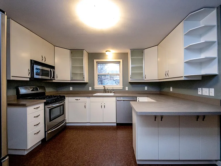 Kitchen view. Brand new Kitchenaid dishwasher installed in 2020.