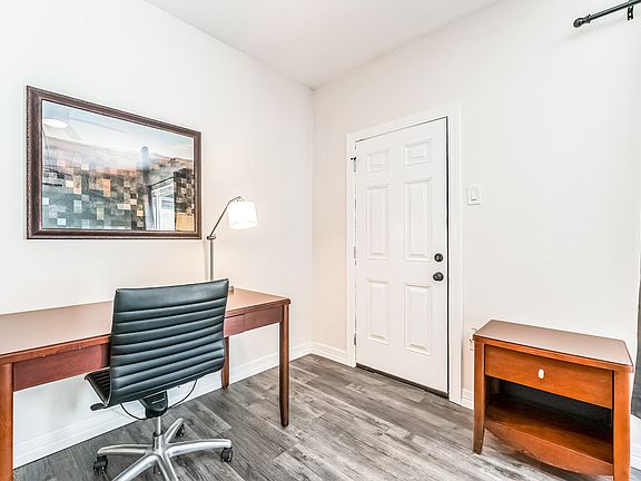 Comfortable desk with chair and lamp. Room includes a non-smart TV (need your favorite USB device for streaming to attach)