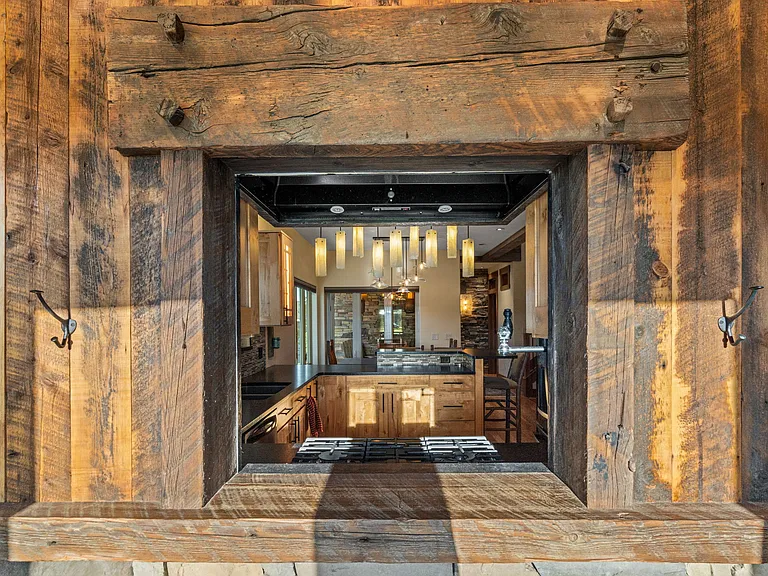 Custom reclaimed lumber accents throughout.