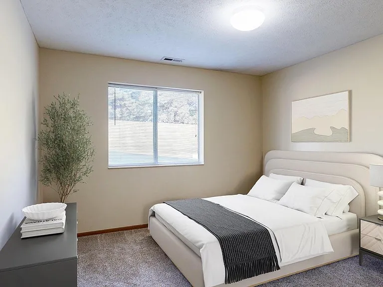 A restful bedroom retreat with space to unwind and recharge.