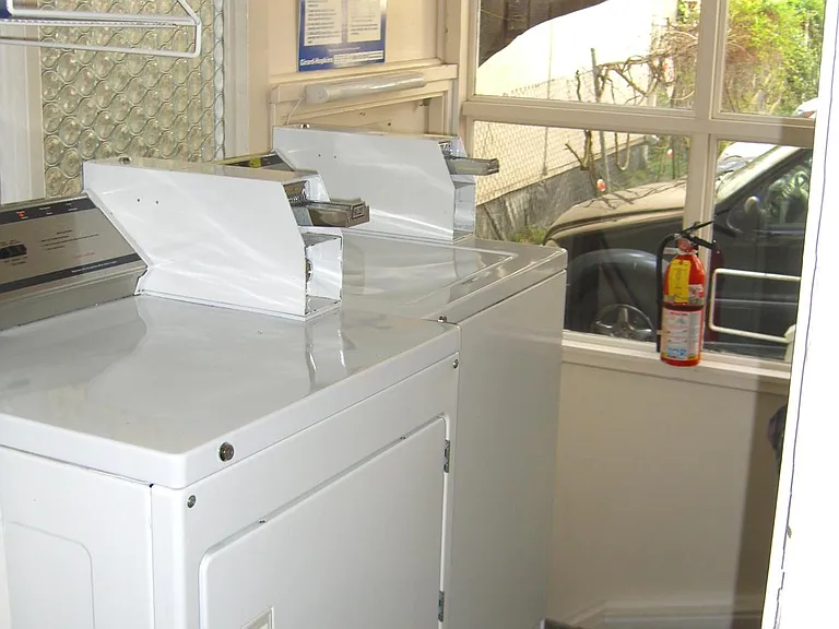 Shared coin op washer/dryer