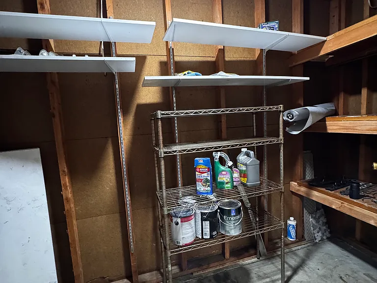 Storage and work bench off carport