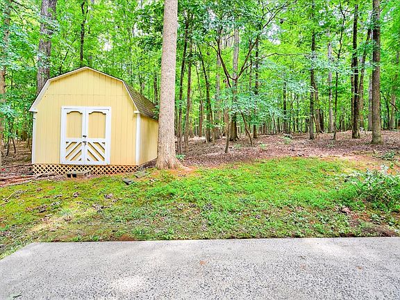 Beautiful patio for grilling, setting up a hammock, or walking straight into Duke forest trails.