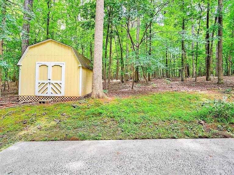 Beautiful patio for grilling, setting up a hammock, or walking straight into Duke forest trails.