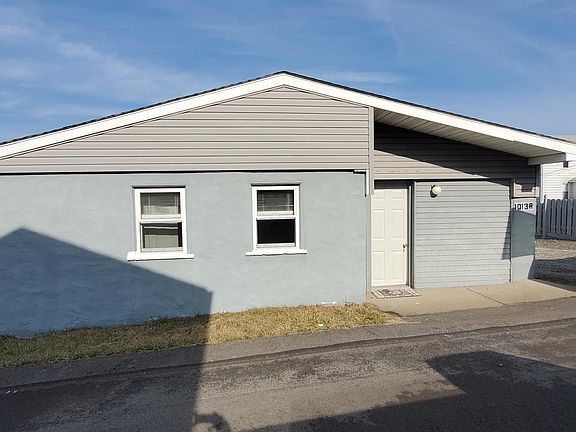 REAR ENTRANCE AND BEDROOM WINDOWS