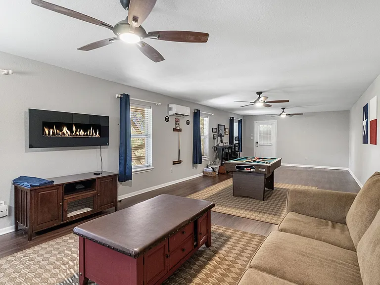 Basement / Game Room / queen sleeper sofa / fire place + more!
