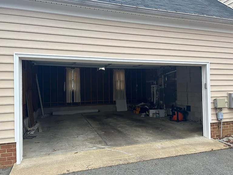 2 Car Garage with plenty of room for 2 cars and additional storage.