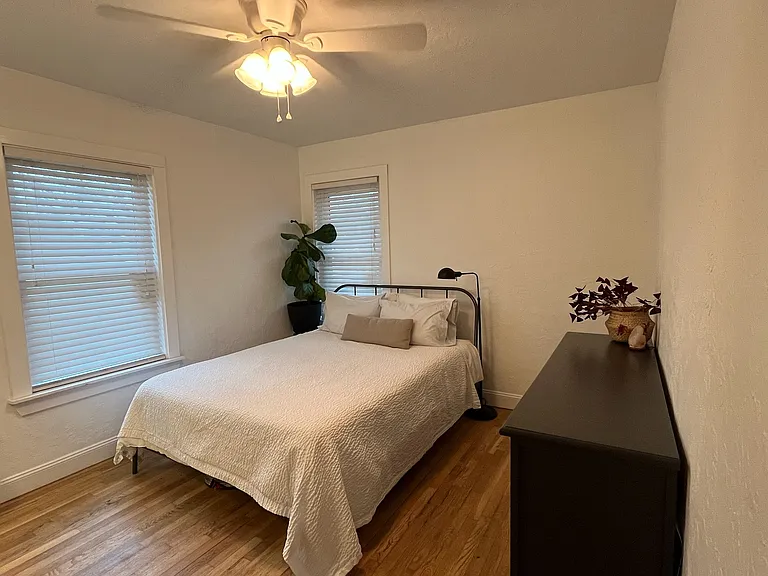Bedroom 3 / Furnished with queen sized bed and dresser