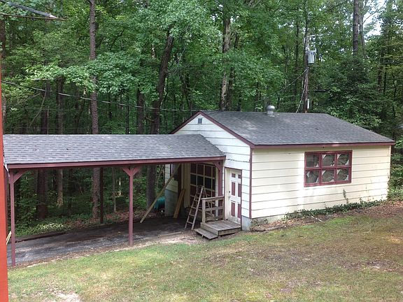 Large Garage with Power and Carport