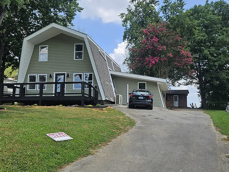 Driveway. Plenty of parking in front and rear of the property.