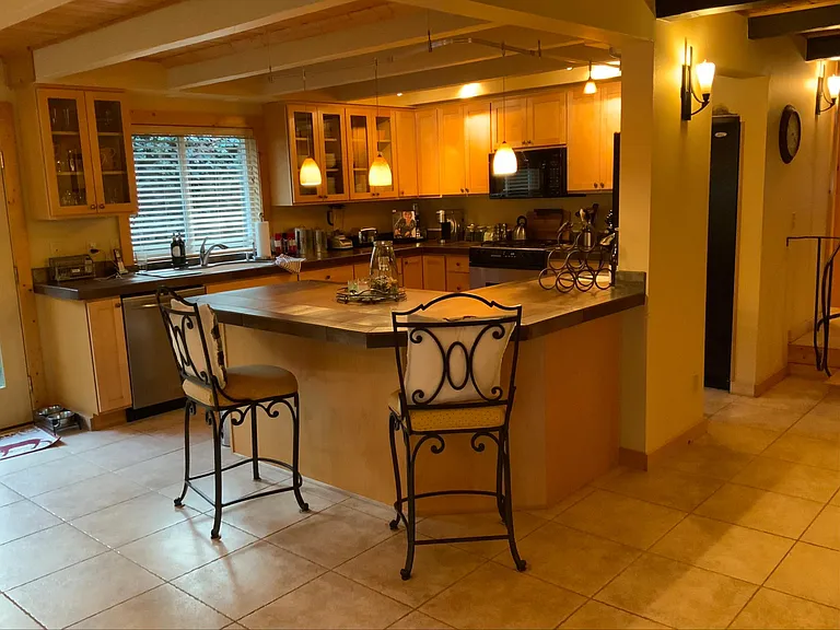 Island bar area with seating.