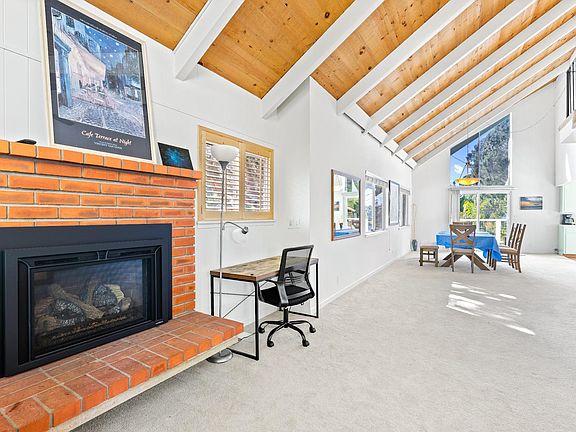 Fireplace and work desk in living area