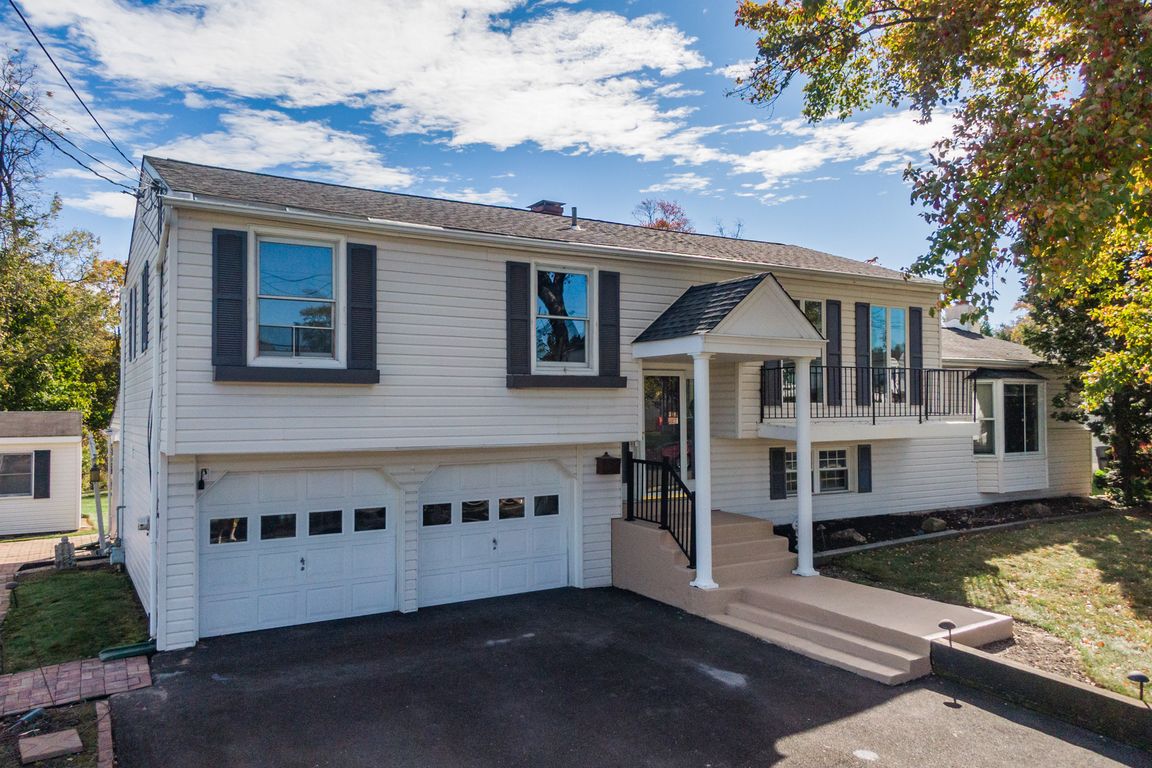 Spacious driveway for 4+ cars & garage