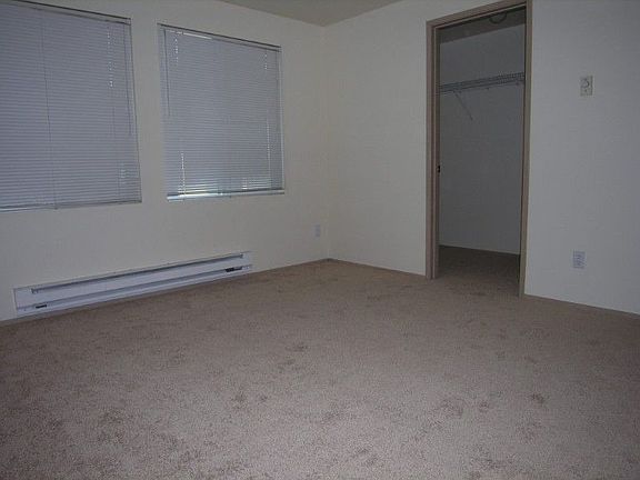 Bedroom with walk-in closet