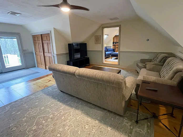 view of living room from the office and bed area