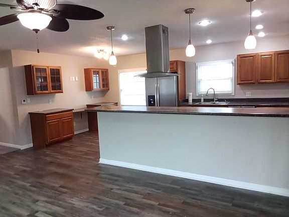 Open-concept kitchen from dining room.