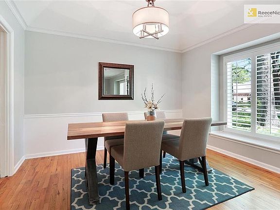 Formal dining room has loads of charm