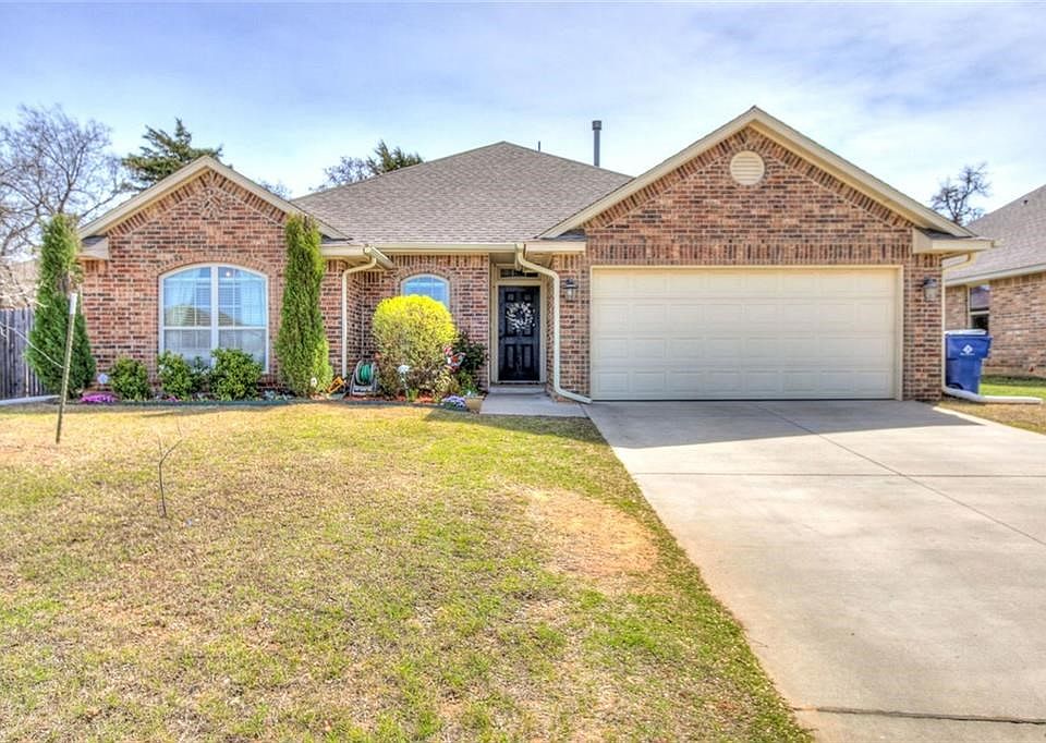 Front of the property.  Beautiful landscaping.