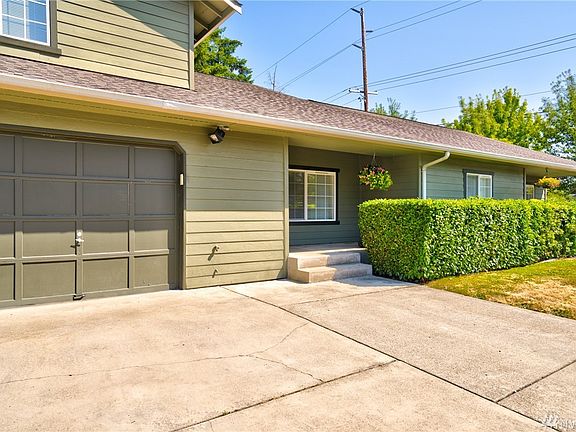 Single car garage and 2 parking spots. Large front patio for entertaining. 