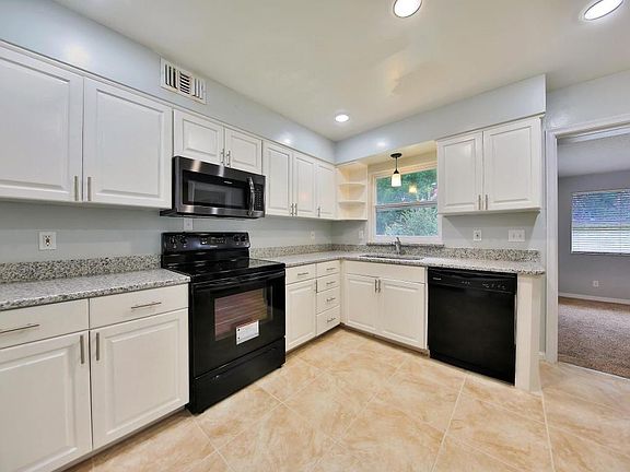 5th image of 8358 Bordeau Ave N