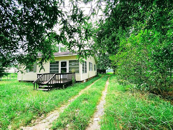 Small Farm House Sits Just off the Road. Conveys at No Value