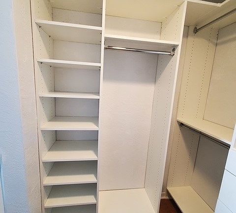 Walk-in closet in bedroom