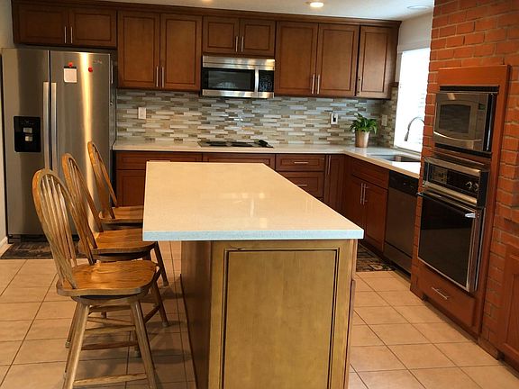 updated remodeled kitchen with large sit in island