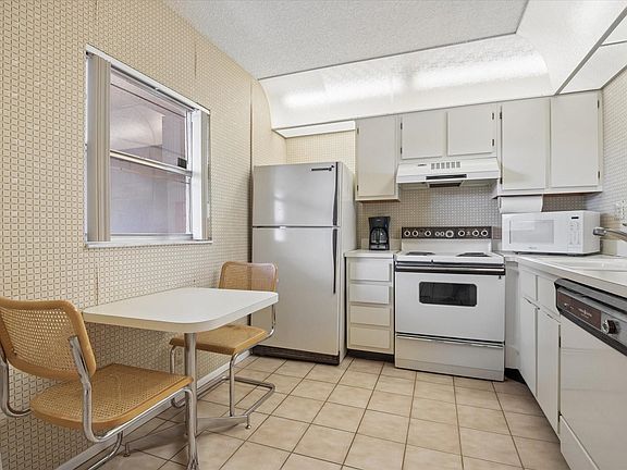 4th image of 7368 Woodmont Avenue #203