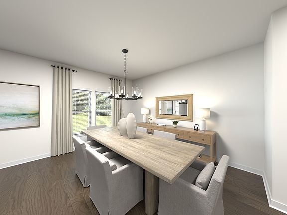 The open-concept floorplan allows for an easy flow between the kitchen and dining areas.