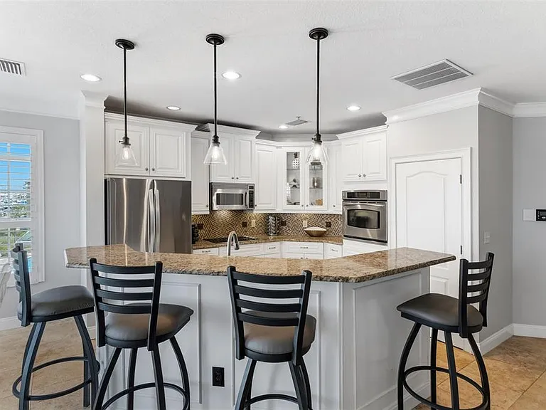 6420 Sunset Bay Cir — Photo 17