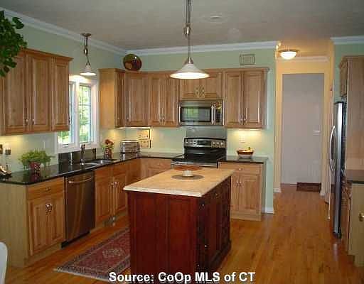 Granite/Marble kitchen with stainless appliances