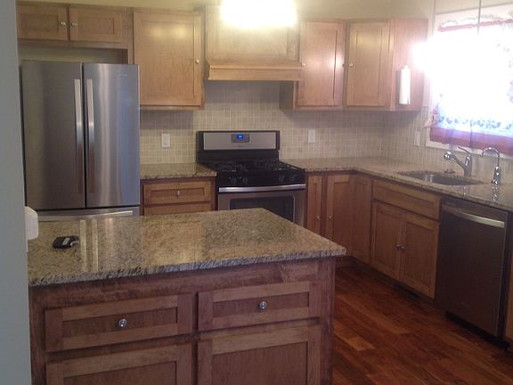 Kitchen: stainless steel appliances, granite counter tops, h