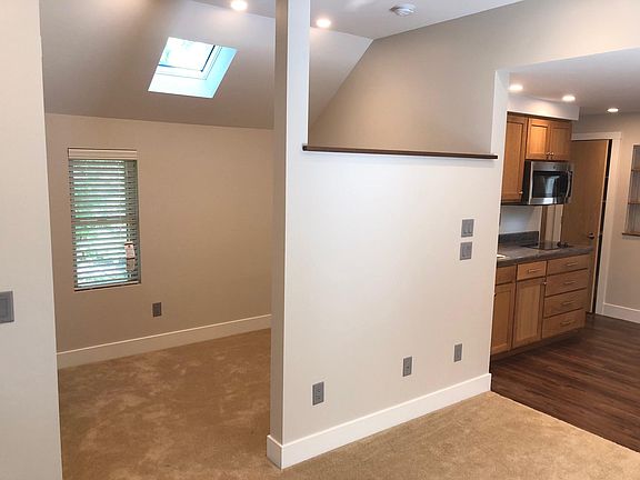 Living room looking into sleeping area.