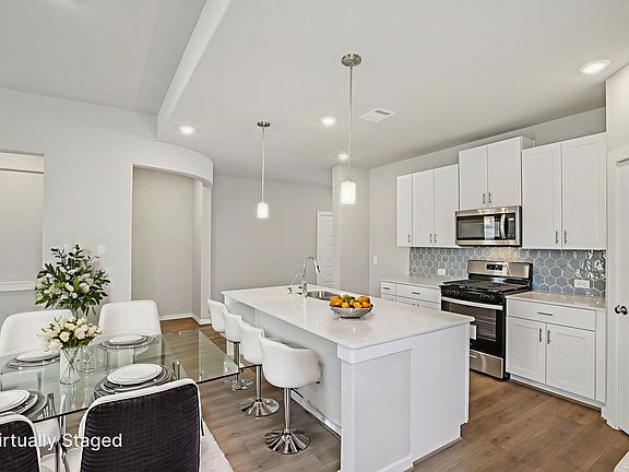 The Texoma floorplan in Glendale Lakes of Rosharon, TX.