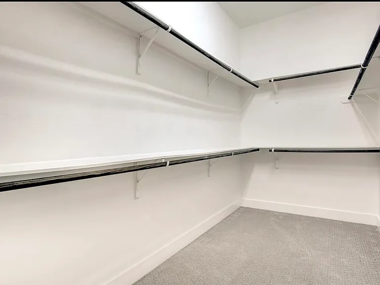 spacious master walk-in closet
