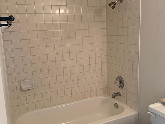 Master bathroom. This bathroom is only accessible from the master bedroom. New vanity and mirror will be installed prior to move in.