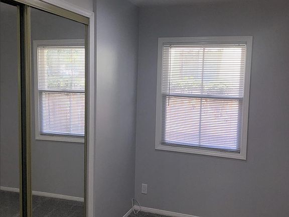 Bedroom #1 with new paint and new carpet.