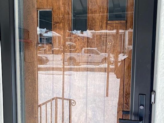 Full glass storm door