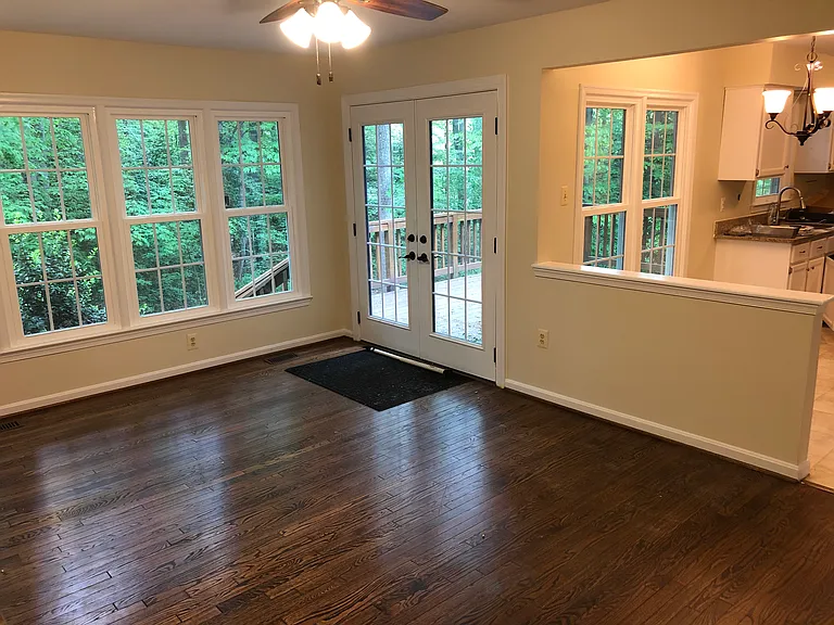 Updated view of Second Living Room without wooden rail dividers separating kitchen.