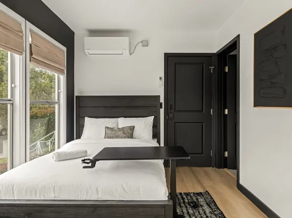 A 4 Bedroom, 3 Bathroom apartment with common areas and a fully functional kitchen at 1476 Malcol...